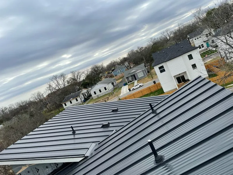 Standing seam metal roof panels with vents for Skylight Repair in Northlake